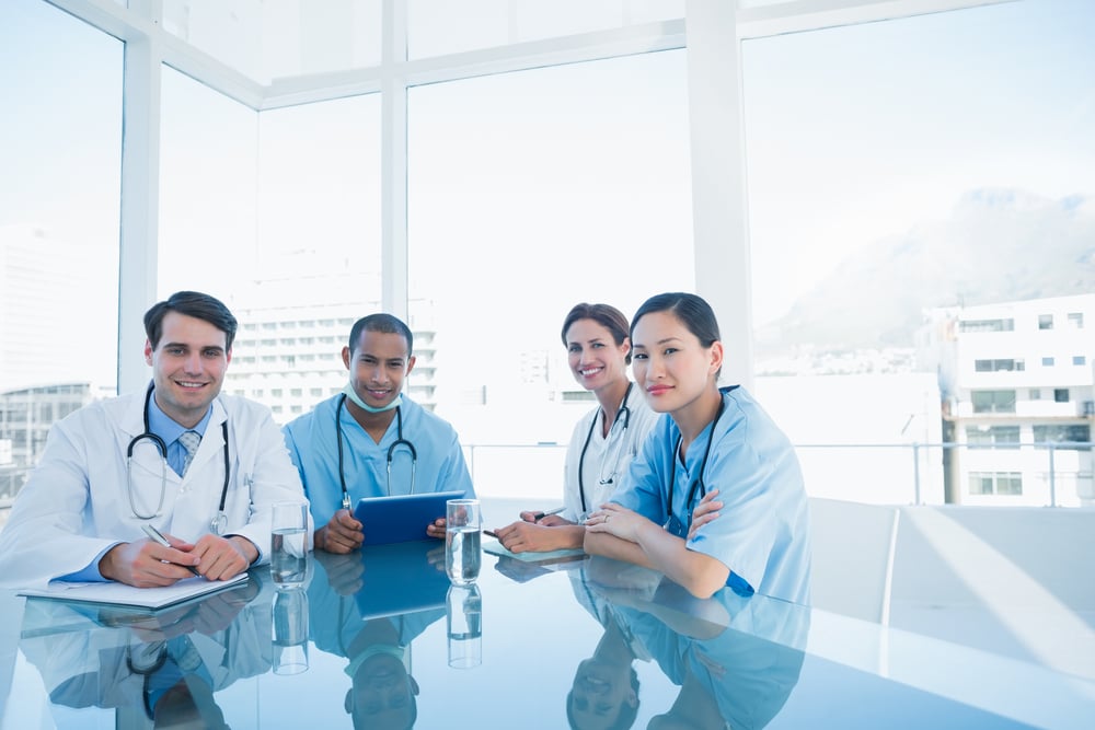 Group portrait of young doctors in a meeting at hospital