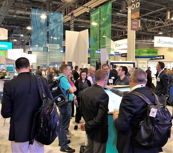 Attendees visiting the MEDITECH booth during HIMSS18 in Las Vegas in March.