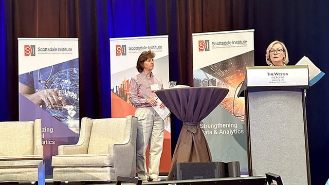 Janet Guptill and Gail Donovan of Scottsdale Institute on stage welcoming attendees to the 2024 SI Annual Conference
